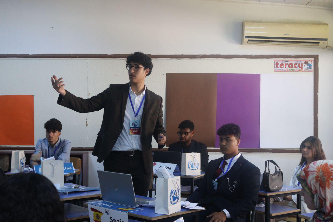 MUN delegate speaking at a conference